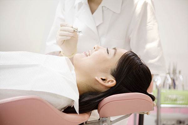 IV Sedation | Dr. John M. Cherry, Jr., DMD - Brandon Dentist | woman lying back waiting for iv sedation