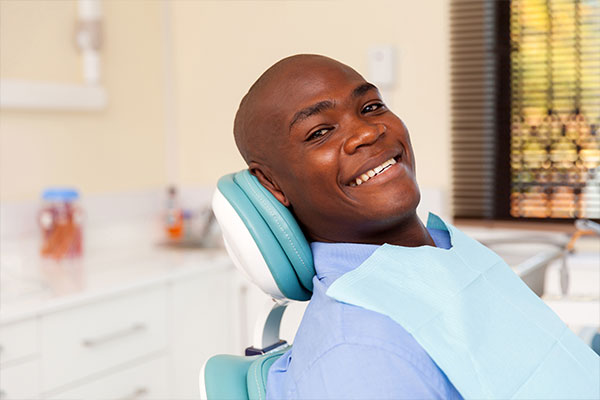 man smiling before bone grafting