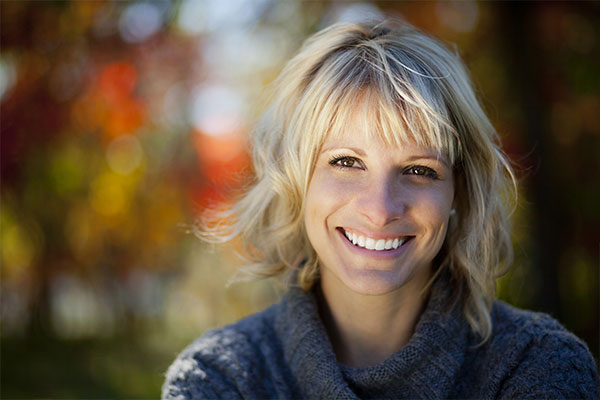 Restorative Dentistry | Dr. John M. Cherry, Jr., DMD - Brandon Dentist | woman smiling after restorative dentistry