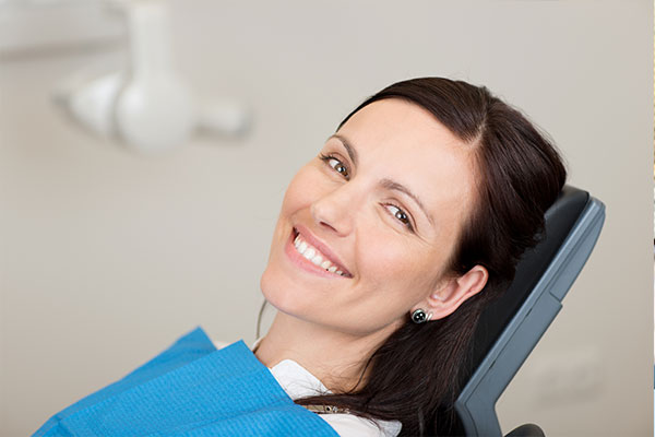 woman smiling before sedation dentistry