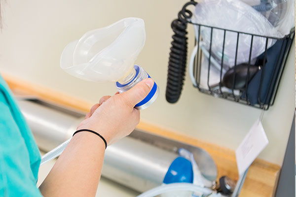 Sedation Dentistry | Dr. John M. Cherry, Jr., DMD - Brandon Dentist | dental staff prepare mask for sedation dentistry