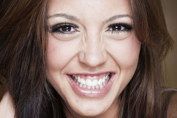 Porcelain Veneers | Dr. John M. Cherry, Jr., DMD - Brandon Dentist | woman smiling after getting veneers