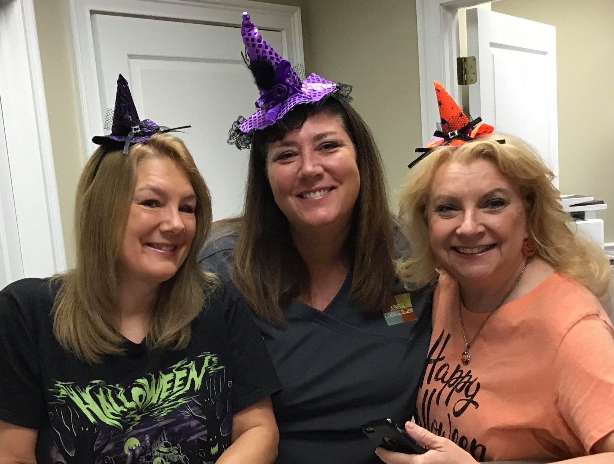staff at halloween party